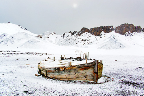 Old water boat at Whalers Bay on Deception Island, Antarctica